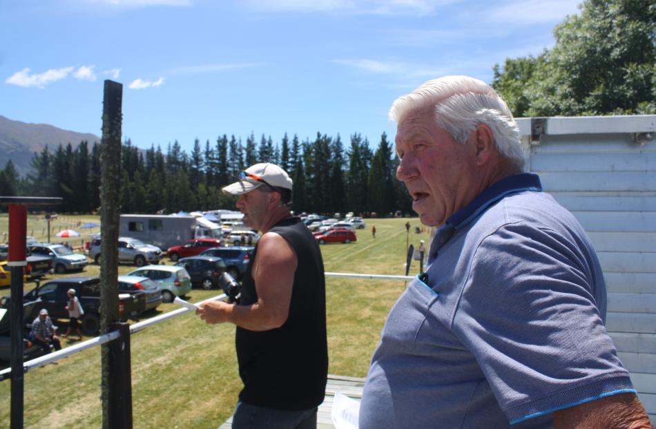 Racing judge Fred Muir (front) and commentator Gary Smart are keeping an eye on a race during the Hawea Picnic Racing Club equalisator race meeting at the Hawea Flat Domain yesterday.