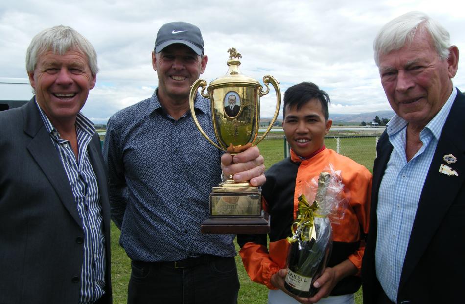 Omakau gallops movers and shakers (from left) Central Otago Racing Club president Tony Lepper; former All Black and now horse owner and trainer Bevan Wilson, previously of Omakau, now of Ashburton, whose horse Flag the Groom won the Clare Memorial Gold Cu