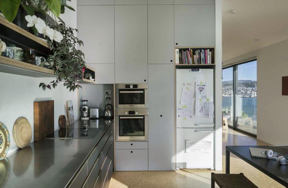 In the kitchen, with the deck on the right. 