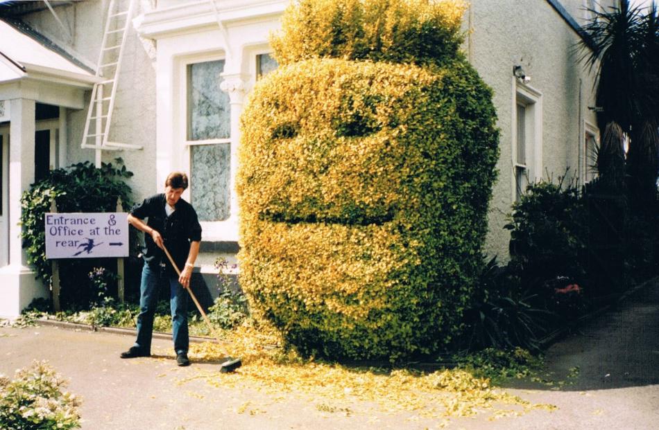 Sandra Scott-Harrison with ‘‘Wilson’’, her topiary hedge in Christchurch. Photo by Sandra Scott-Harrison.