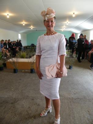 Bev Kenny, of Lawrence, who won the women's division of the Fashion in the Field, shows off her outfit.