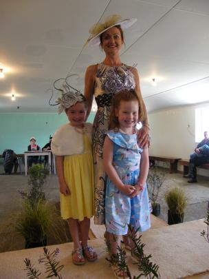 Helen Curtin, of Rolleston, poses with her daughters Eleanor Thomas (5, left) and Josephine Thomas (4), after the fashion event yesterday.