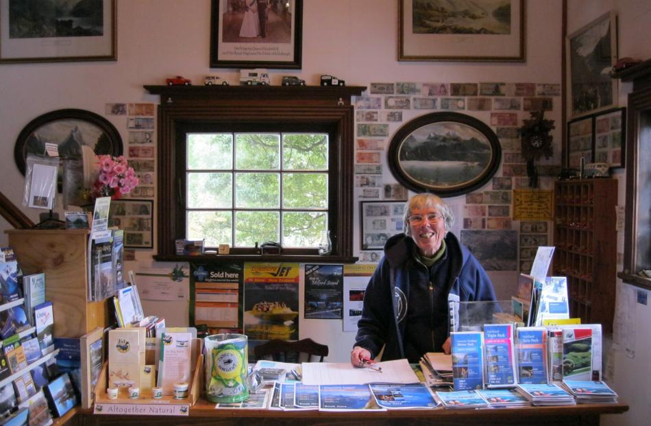 Joelle Nicholson mans the reception desk of the Manapouri Holiday Park.