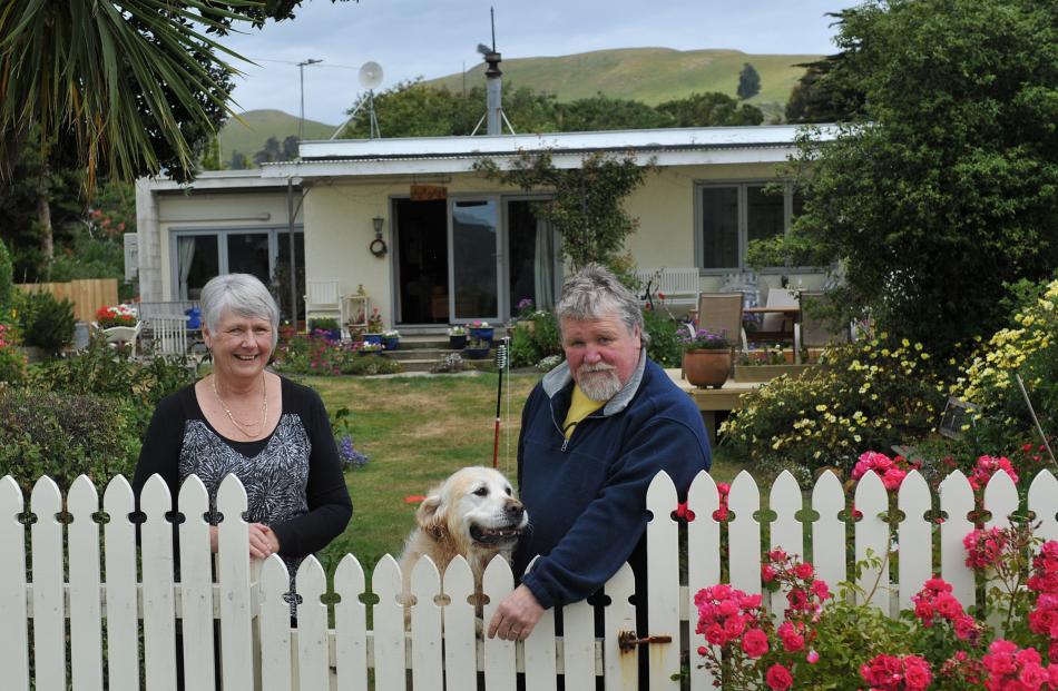 Alan and Irene Gunning, with dog Colby yesterday.