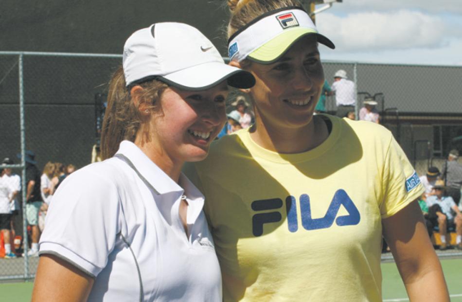 Winton’s Emilia Price (left) and Kiwi tennis ace Marina Erakovic enjoy a chat after  the mixed...