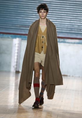 Outfits were often layered and looks were accessorised with face paint, paper crowns, colourful...