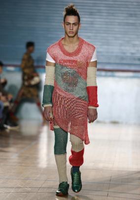 Models wore colourful knits made up of jumpers and trousers as well as long dresses and arm cuffs, at times slit on the sides. Photo: Reuters