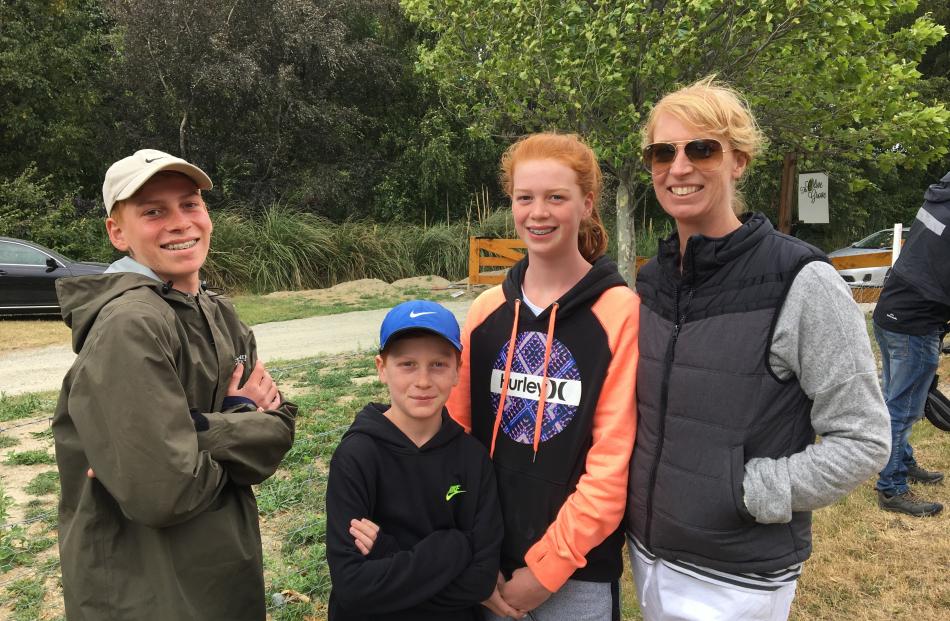 Dallow family of Max (14), Gus (9), Florence (12) and Amanda of Auckland wait outside the gates of the Olive Grove in Wanaka hoping to catch a glimpse of Richie McCaw and Gemma Flynn. Photo: Tim Miller