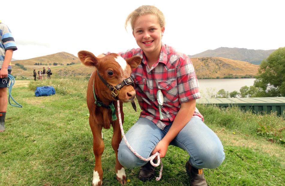 Milly Lewis (11), of Wanaka, with 3-week-old Hank.
