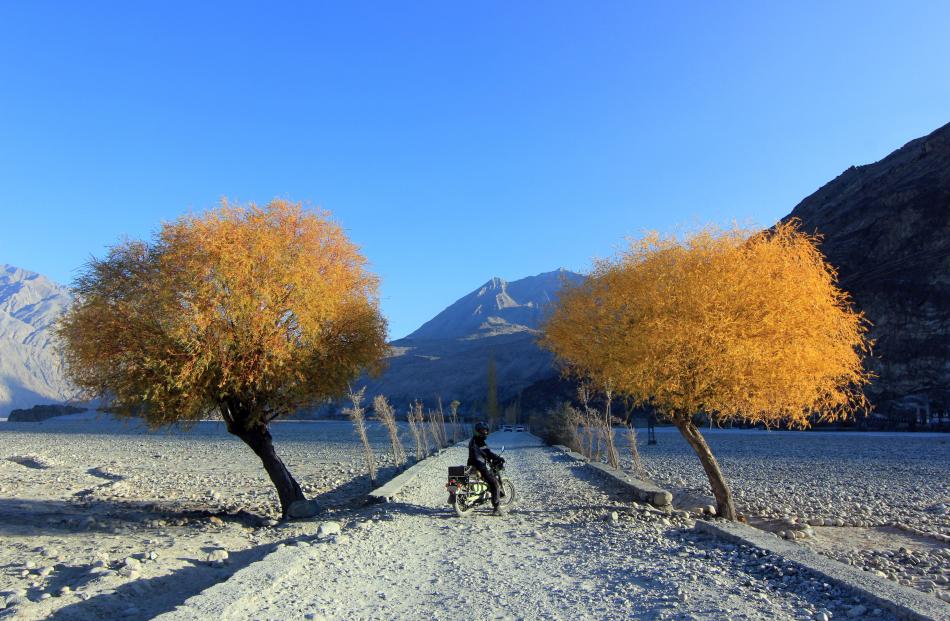 Celia Neilson pauses on the road between Khaplu and Hushe, in Ghanche district in Pakistan.
