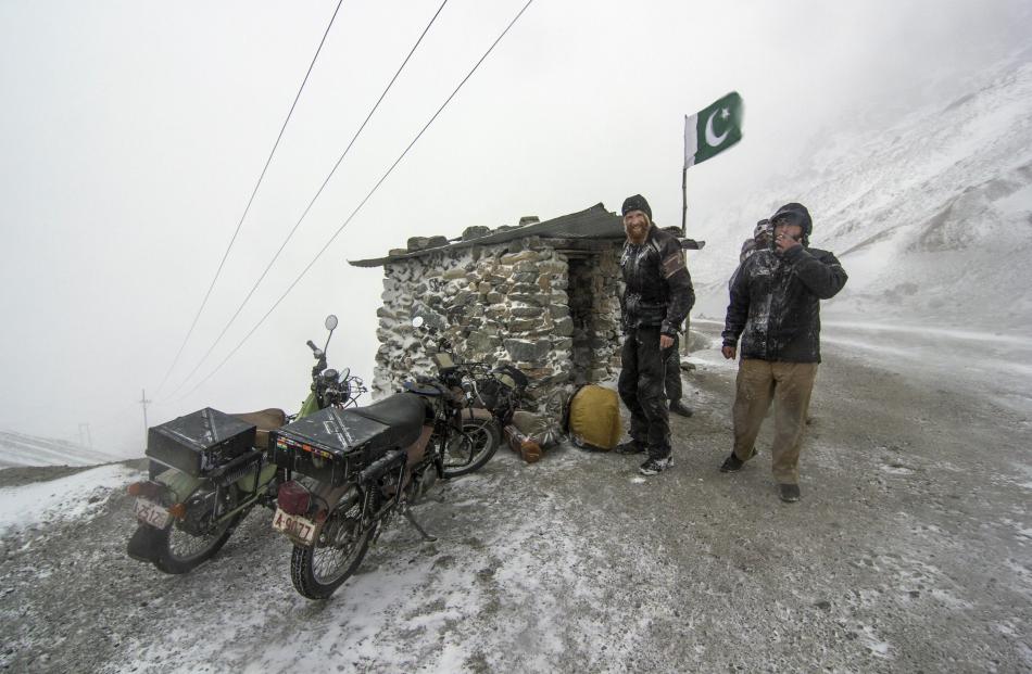Stephen Hogg (left) at the top of the Lowari Pass in Pakistan.
