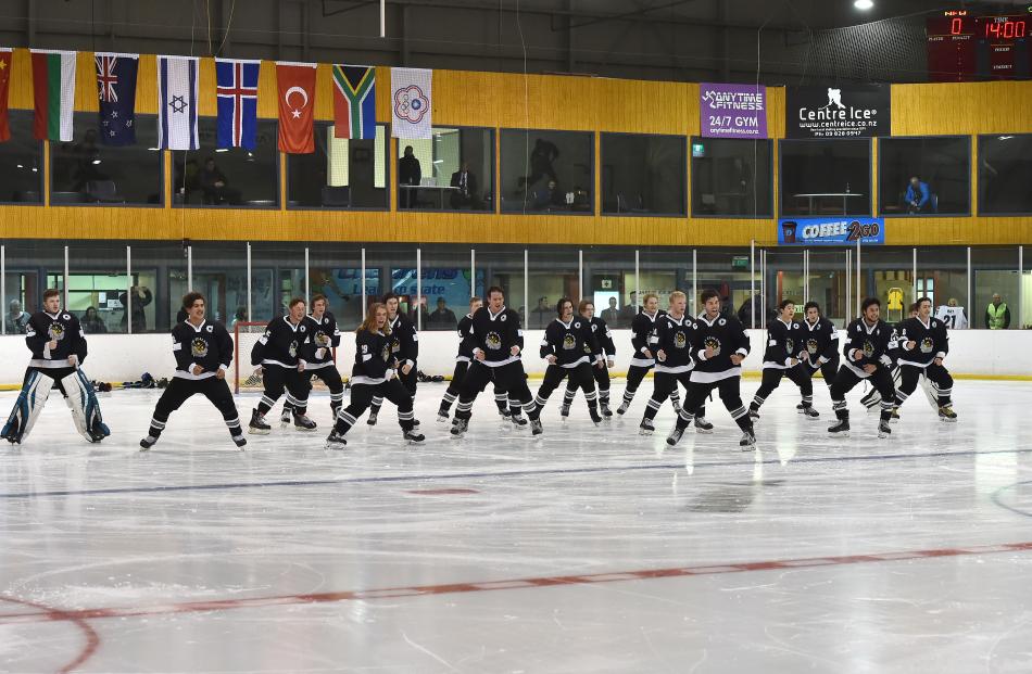 The New Zealand ice hockey under-20 division three team performs the haka before playing South Africa at the Dunedin Ice Stadium last night. 