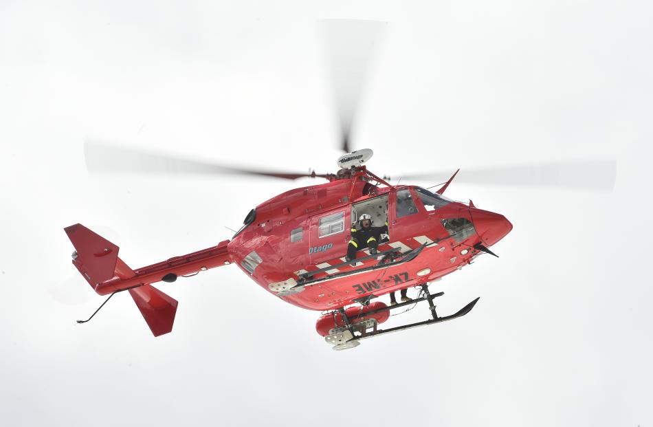 The Otago Regional Rescue Helicopter searches for the missing person. 