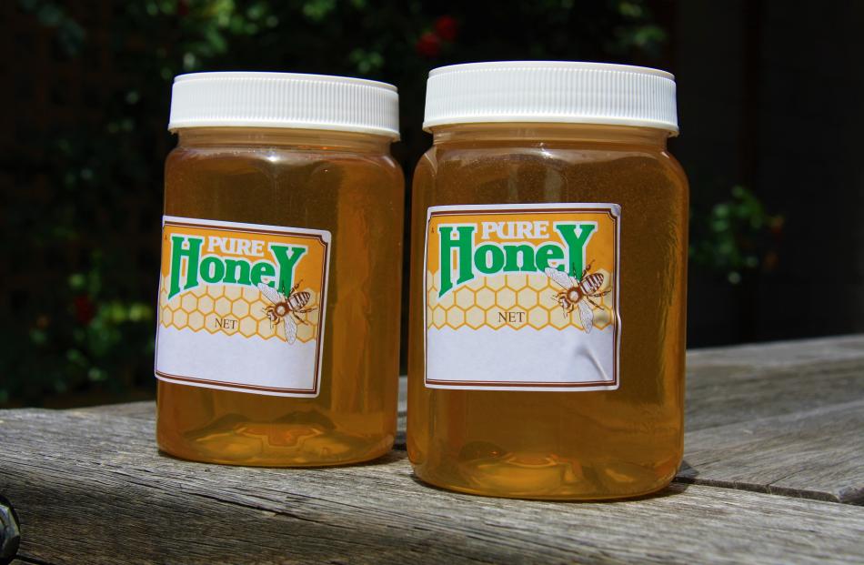 Jack Innes’ first honey collection gets the seal of approval.