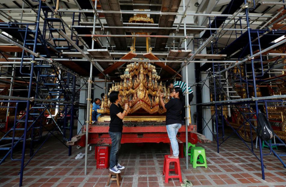 Built of wood and decorated with gold and mirrors, the 13.7 tonne chariot is 18 metres long, 11.2m high and 4.8m wide. Photo: Reuters