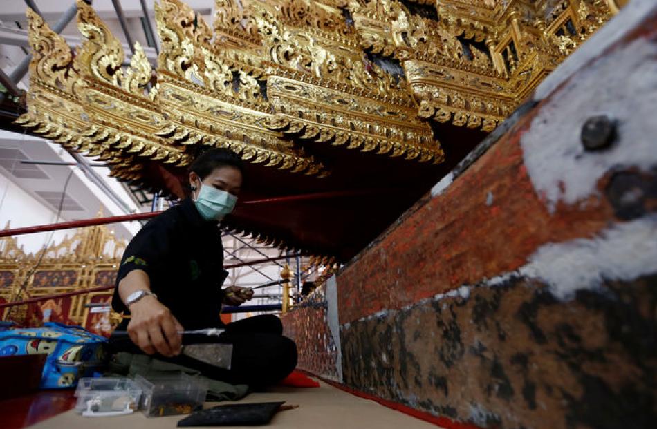 It will carry the ornate urn containing King Bhumibol Adulyadej's body to the site of the cremation at the Sanam Luang ground outside the Royal Palace. Photo: Reuters
