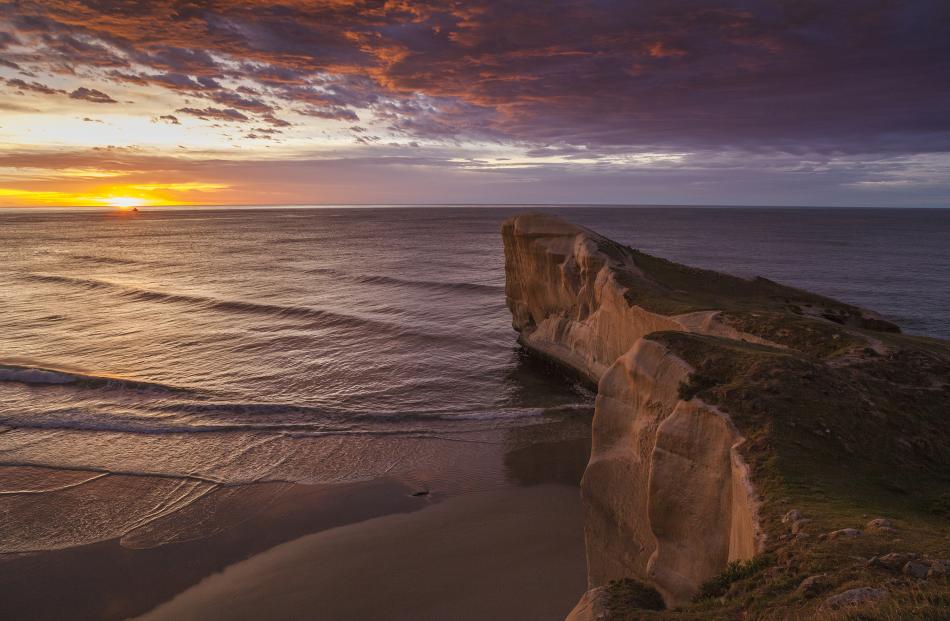 A very colourful morning at Tunnel beach. Photo: Douglas Thorne