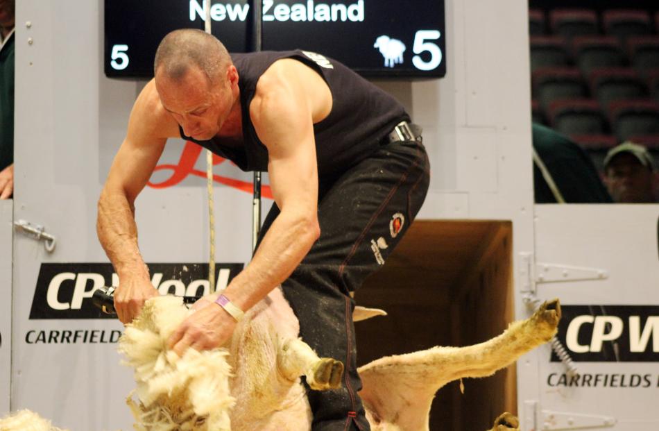 Johnny Kirkpatrick, of Napier, shears over the shoulder on his way to winning the World Shearing...