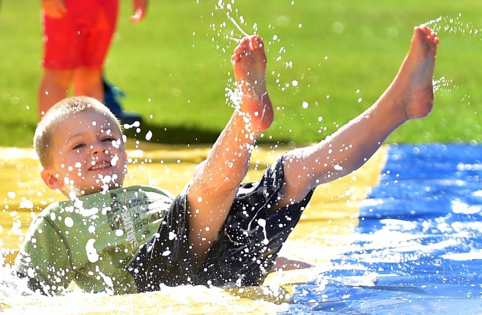 Oliver McKague (4), of Dunedin, revels in the "slide". Photos: Peter McIntosh.