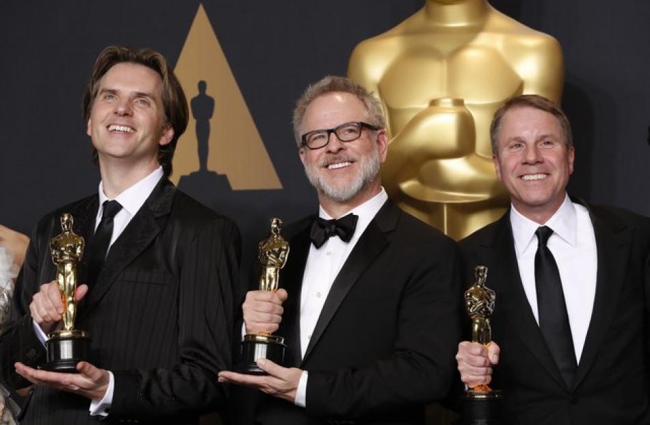 Byron Howard, Rich Moore and Clark Spencer winners of Best Animated Feature Film for "Zootopia". Photo: Reuters