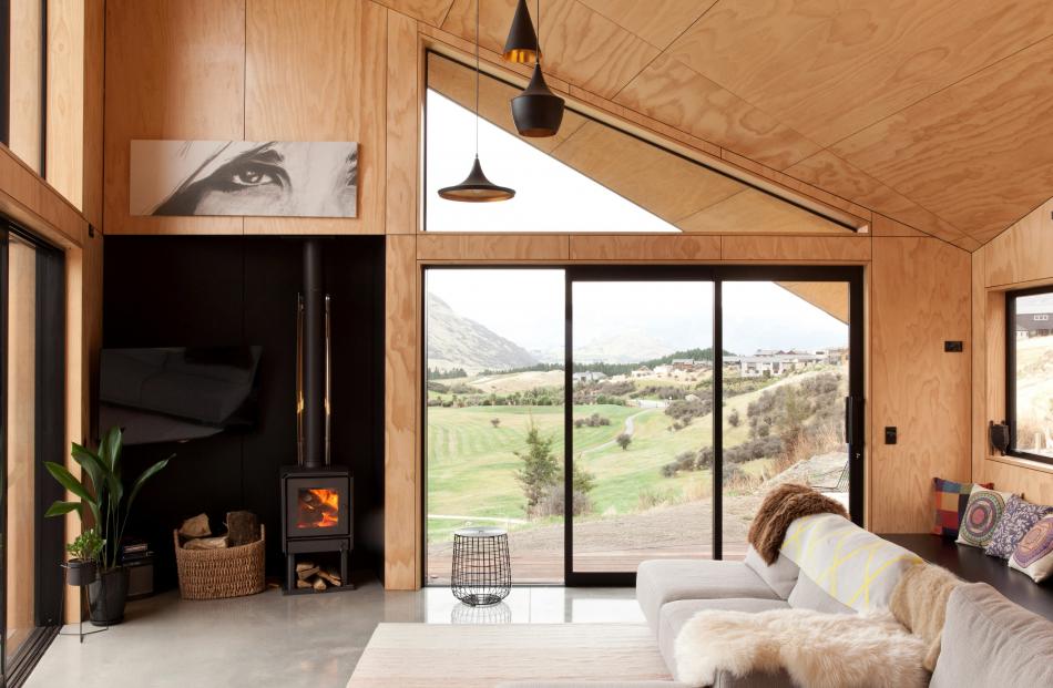 Windows are carefully positioned to screen out neighbours and frame the views. The home’s owner...