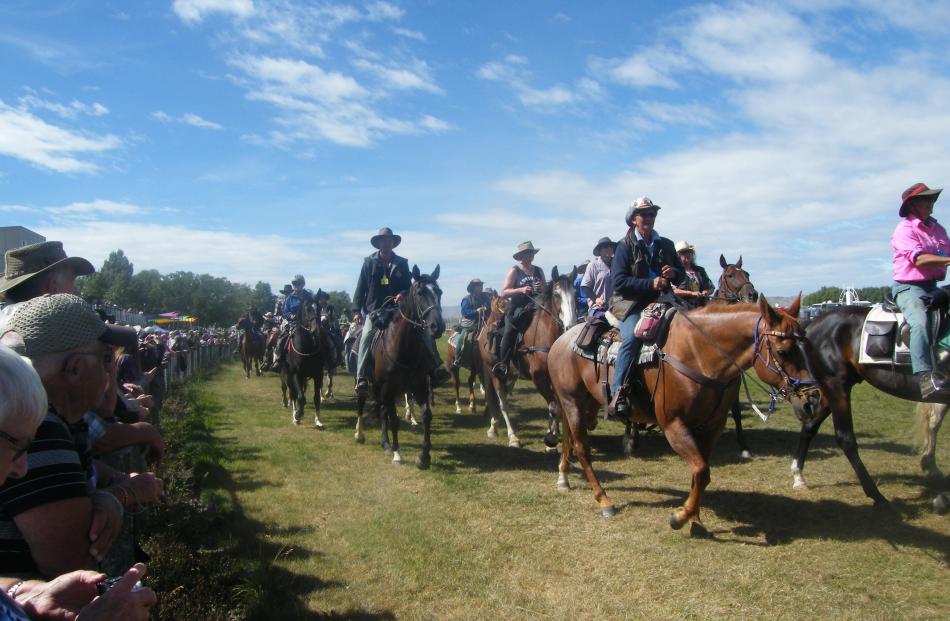 Cavalcaders arrive at the Omakau Racecourse for the grand parade of the Goldfields Cavalcade on...