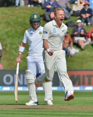 Neil Wagner celebrates his first wicket for New Zealand as South African 
...