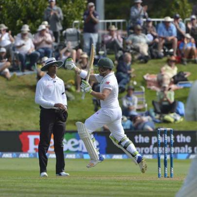 South Africa's Dean Elgar celebrates his century against New Zealand.