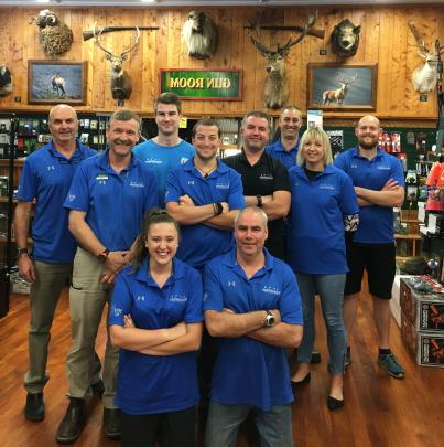 The team at the new Crawford St store of Hunting & Fishing New Zealand Dunedin: (back row, from...