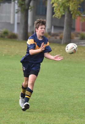 Lucas Erskine, of the Central Otago Mustangs, moves the ball on.