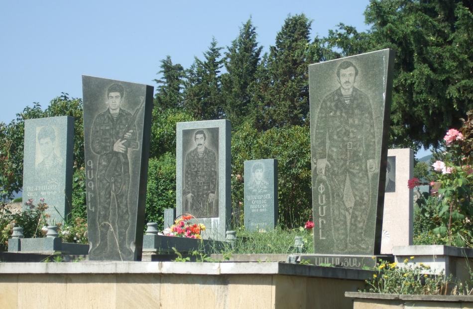 Life-size headstones of soldiers’ graves in the National War Cemetery.







