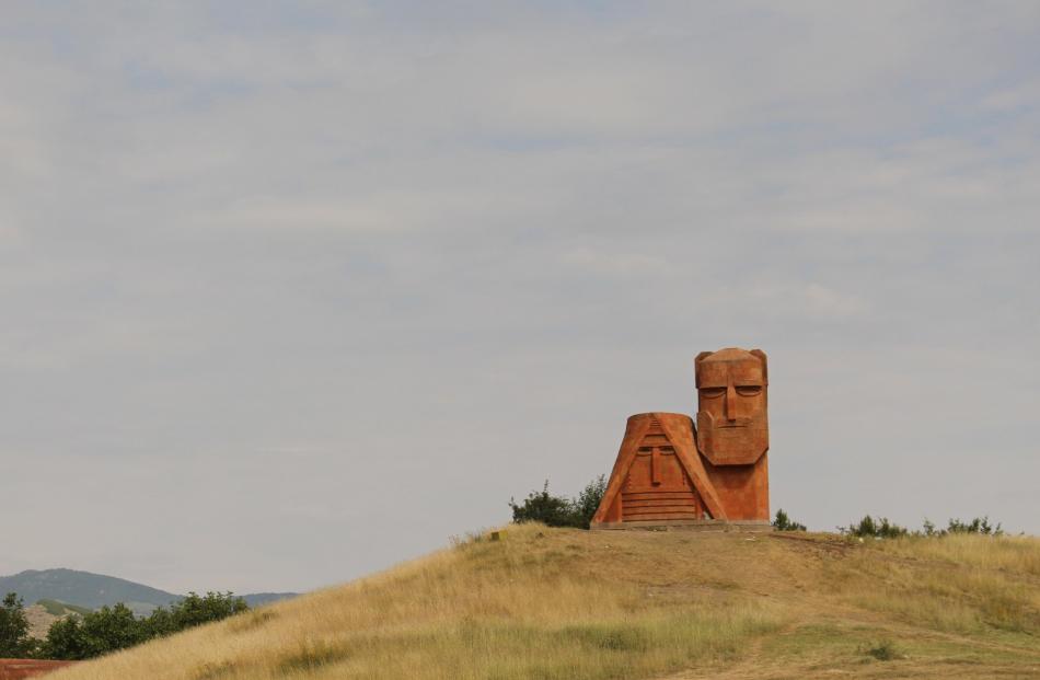 A symbol of Armenian heritage, the ‘‘We Are Our Mountains’’ sandstone monument stands on a hill...