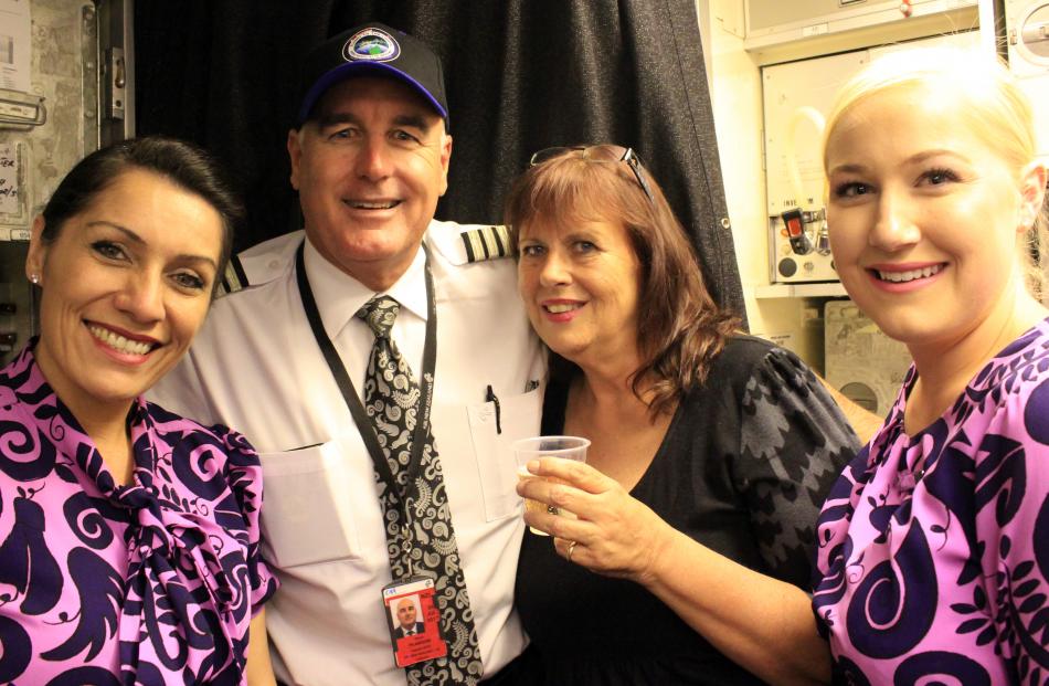 Frith Walker celebrates her birthday, quietly, with Air New Zealand crew (from left) Donna...