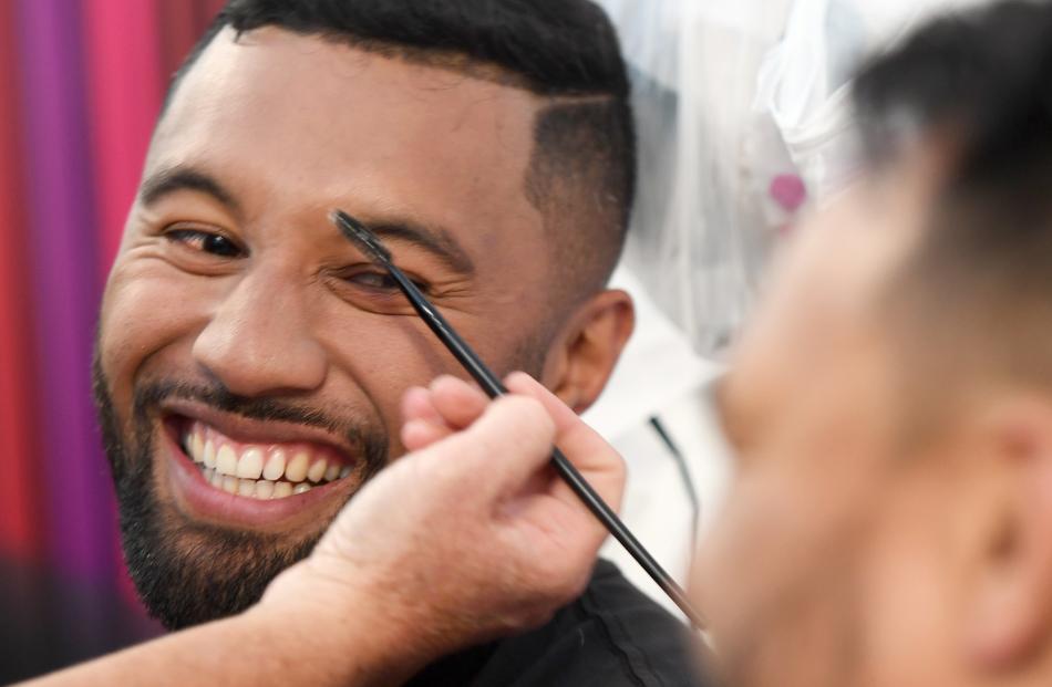 Highlander Lima Sopoaga jokes with team mate Ash Dixon as the pair get made up before the show.