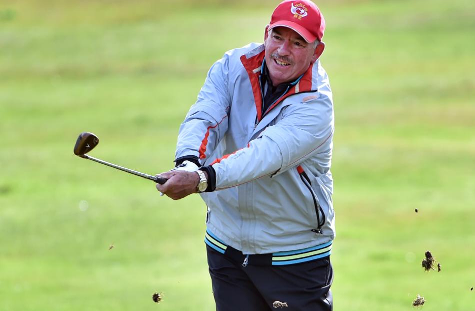 Tim Belcher, of Hutt City, plays an approach shot on the sixth hole.PHOTOS: PETER MCINTOSH
