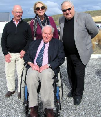 Tony Pearse (left), with Sir Tim Wallis and his wife Prue, Lady Wallis, and Clive Jermy attend the unveiling of a plaque at Wanaka Airport dedicated to the deer industry's pioneers, in 2015. Photo from ODT files.