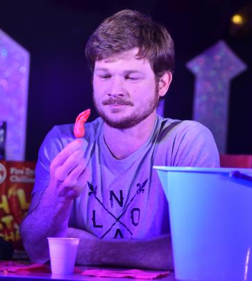 Daniel Greenwood (34), of Dunedin, stares down his chilli at the Dunedin heats of the New Zealand Chilli Eating Champs last night. Photo: Gregor