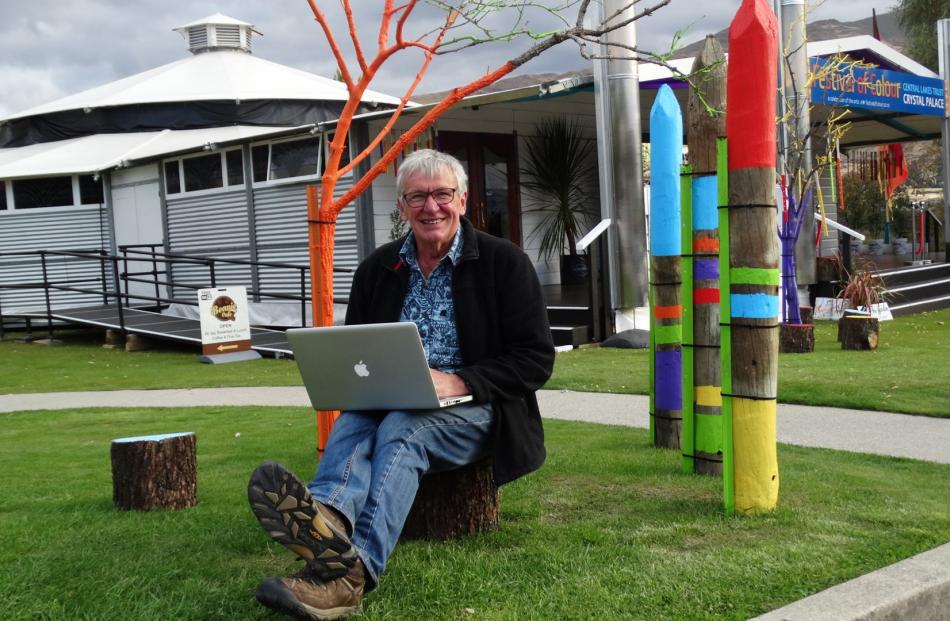 Award winning New Zealand landscape photographer and author Andris Apse, in Wanaka this week, prepares for his Festival of Colour talk at the Crystal Palace last night. Photo by Kerrie Waterworth.