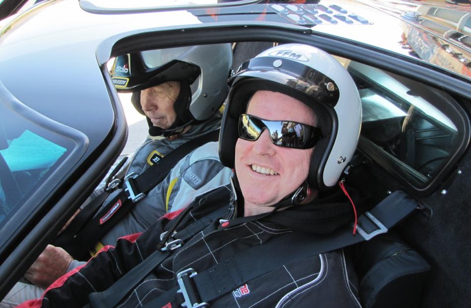 Invercargill man Dale Brook (right) gets ready to be taken for a spin by Grant Aitken, of Queenstown, in Aitken's GT40 at the Highlands Festival of Speed in Cromwell on Saturday. Photos by Pam Jones.