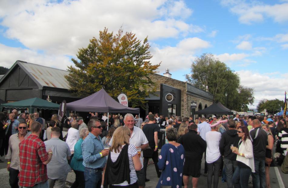 Crowds fill Clyde's historic precinct for the annual Clyde Wine and Food Harvest Festival yesterday.