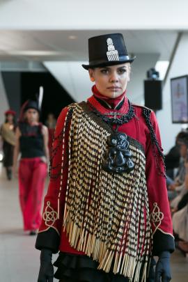 Amber Bridgman’s red woollen military jacket is reminiscent of those worn by European soldiers
...