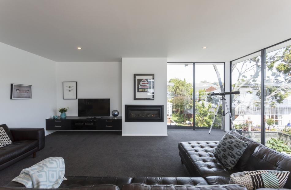 The main living area has floor-to-ceiling glazing and a green outlook: ‘‘It’s an urban site,’’...