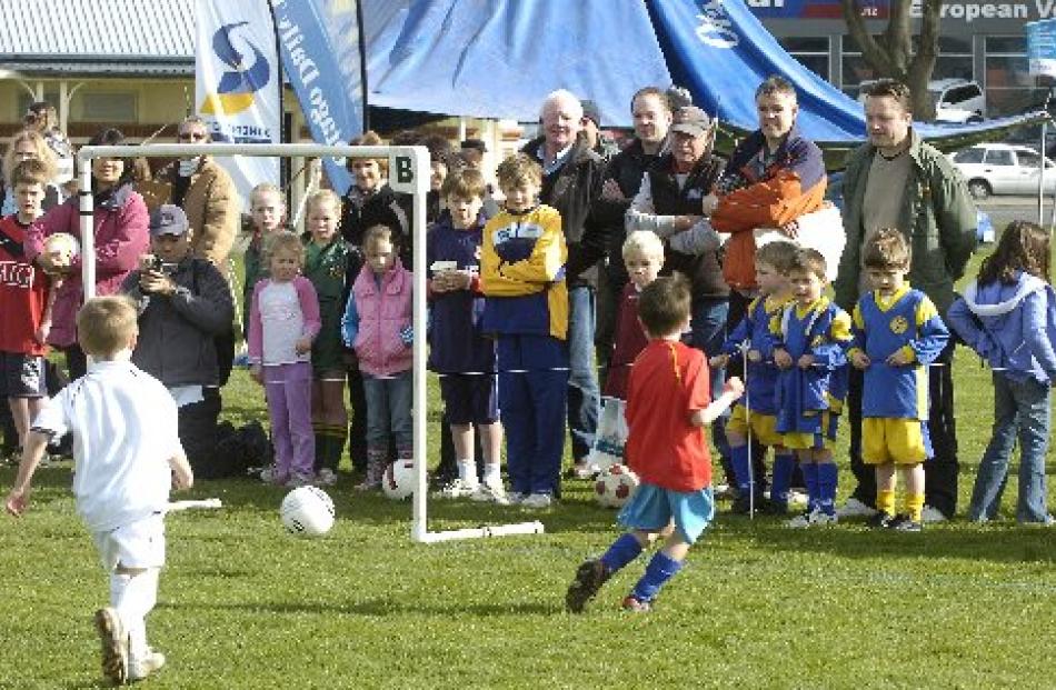 Player of the day Stirling Gates scores a goal.