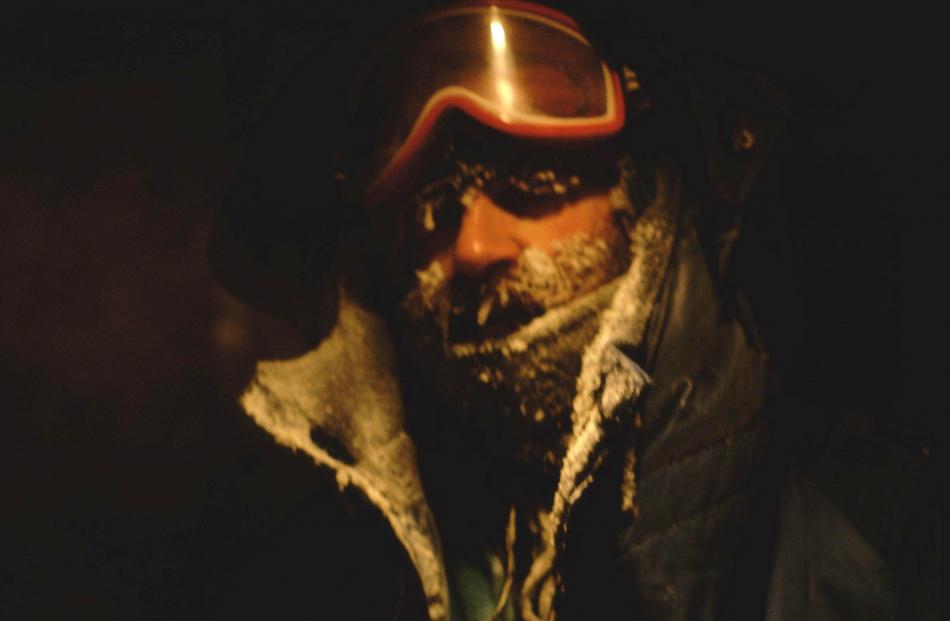 Max Quinn in the middle of an Antarctic winter. Temperatures dropped as low as minus 50degC, giving him mild frostbite and jamming a camera in the five seconds it was open to the air as he changed a tape. PHOTO: DON ANDERSON