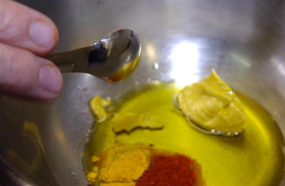 Measure the marinade ingredients into a bowl.