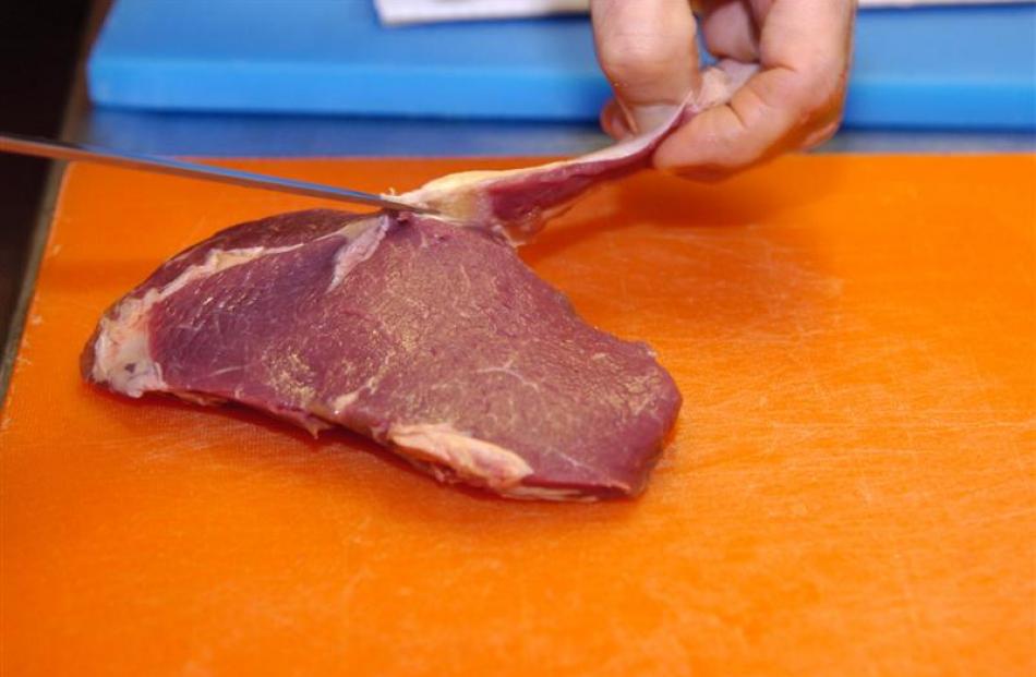 Trim most of the fat off the meat, and remove any sinew, which will shrink and toughen.