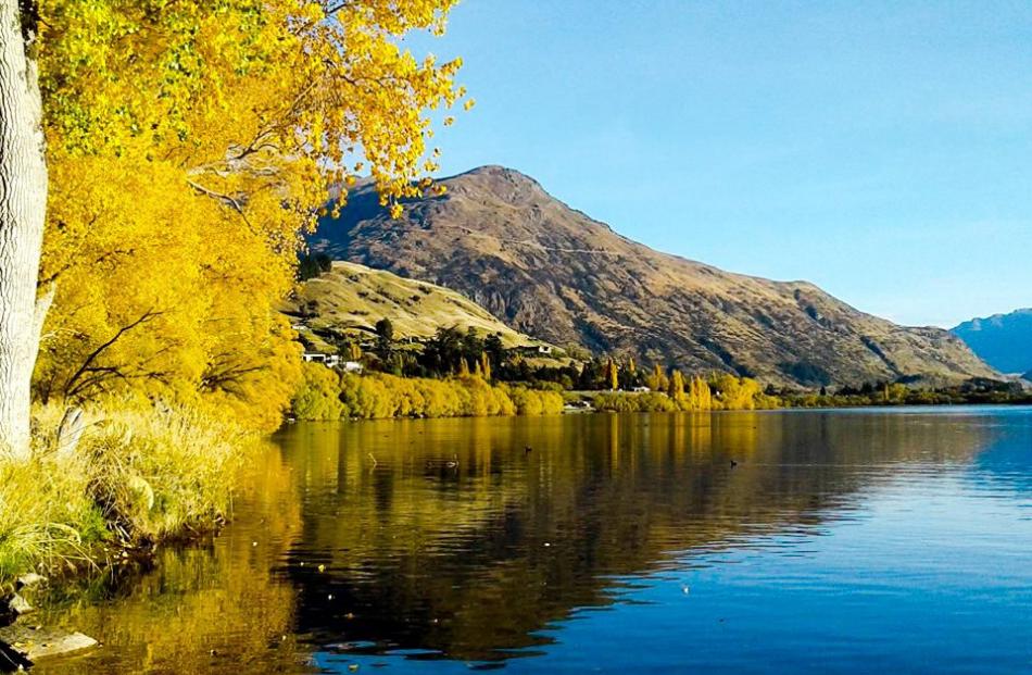 ‘‘Lake Hayes at 5.30pm on Anzac Day. The sun was low in the sky reflecting on to the beautiful...