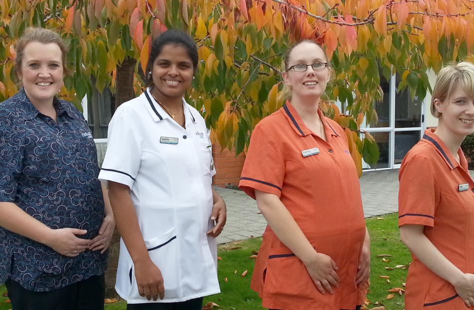 ‘‘Our beautiful blossom tree in Radius Fulton’s courtyard, in Hillside Rd is sporting its autumnal coloured leaves complimenting our blossoming mothers-to-be [from left] Holly McCormick, Sujitha Pallissery, Katrina White and Jodi Neve,’’ writes Beth Sizem