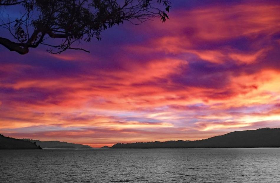 ‘‘Sunrise over the harbour on April 27,’’ writes Peter Cotter, of Macandrew Bay.