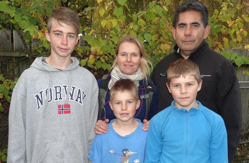 Back, Stian Langvik-Owen, 13, Jeanine Langvik and Geoff Owen, front, Axel, 9, and Sondre, 11...